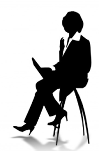 business woman silhouette reading
